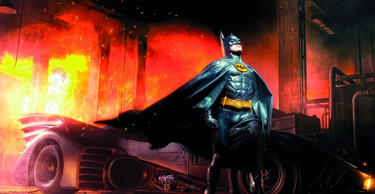 Carl Newman as Batman beside the Batmobile on the set of Batman (1989)